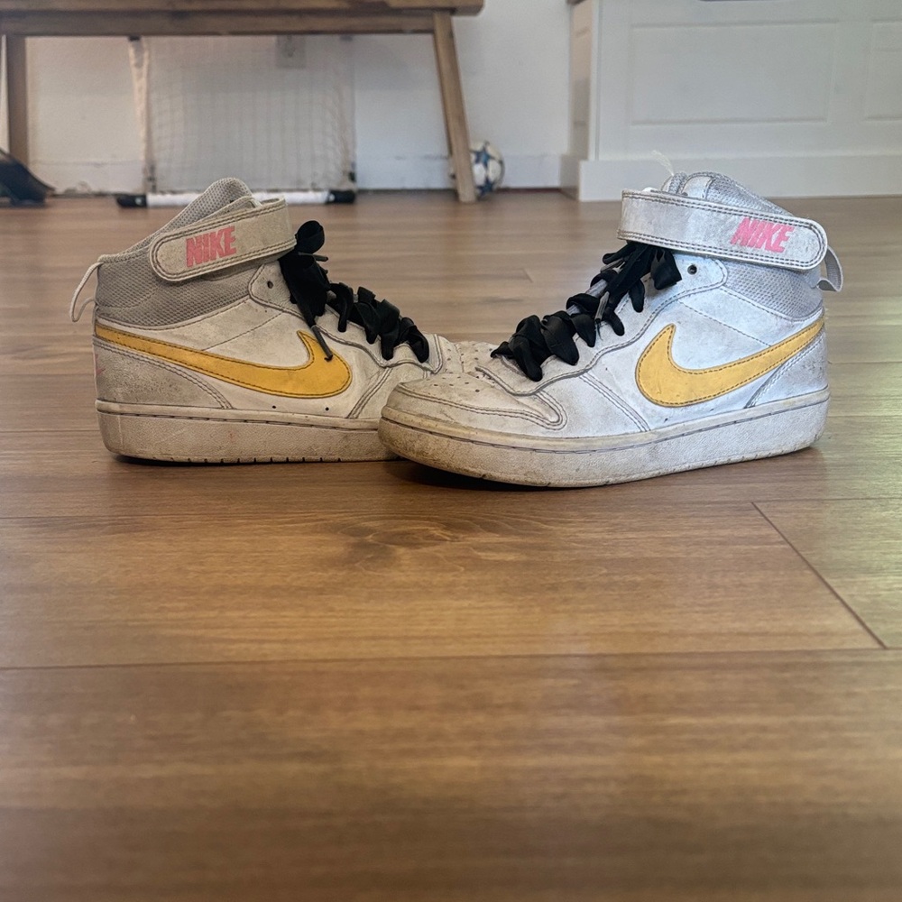 High-top white Nikes, black laces, Velcro and lace-up, used, size 5